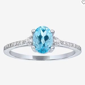 Genuine blue topaz ring